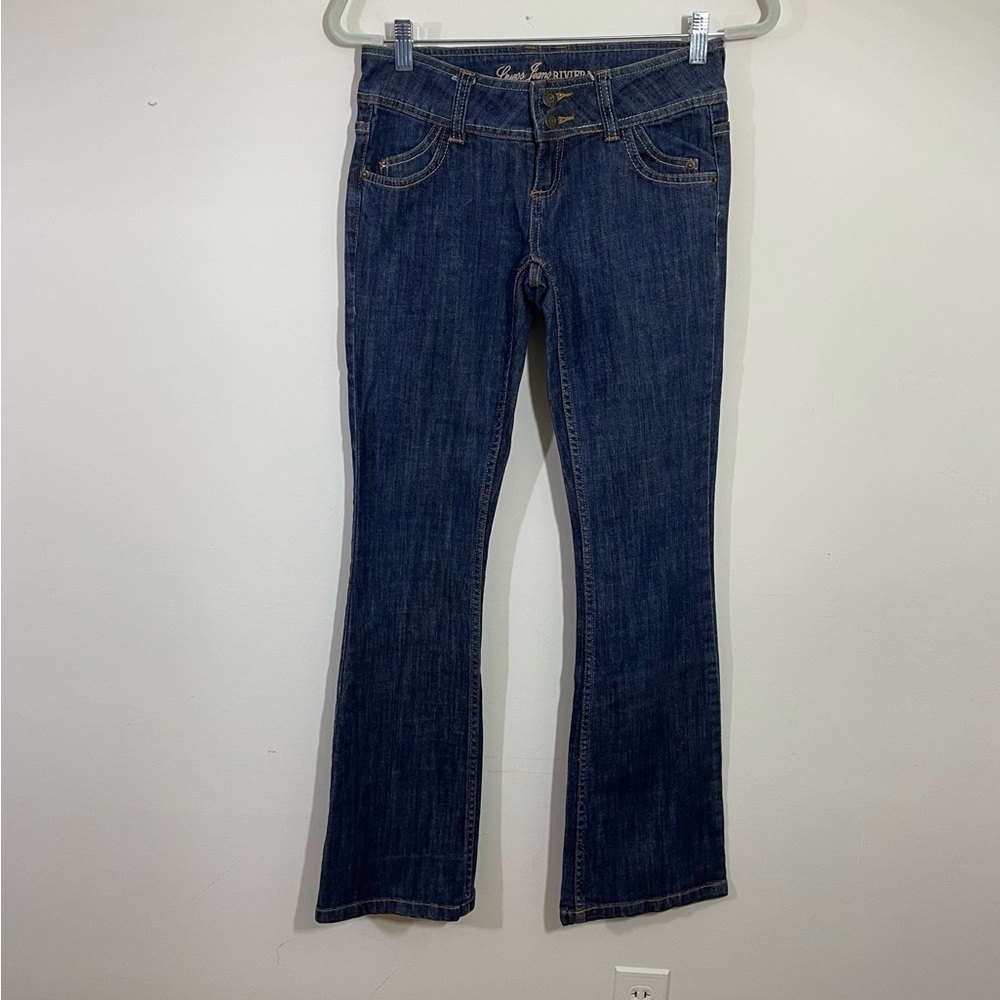 Guess Jeans sz 26 jeans boot cut style in a medium shade